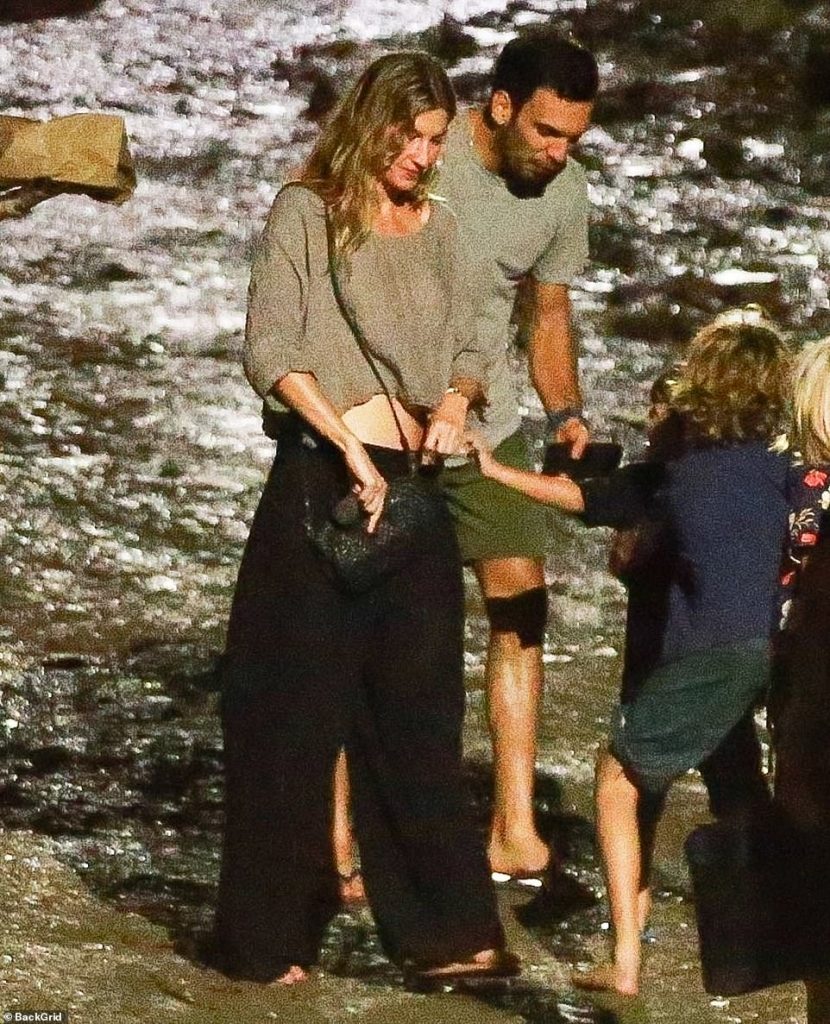 PICTURED: Gisele enjoys a stroll in Costa Rica with jiu-jitsu trainer Joaquim Valente